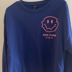 Cropped blue sweatshirt size large.